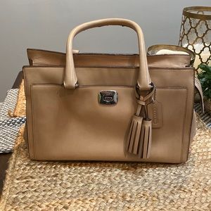 Coach handbag. Some wear and tear on the straps.